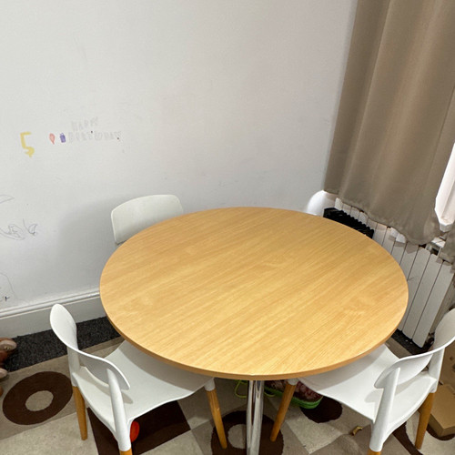 Round light wood dining table - light,
